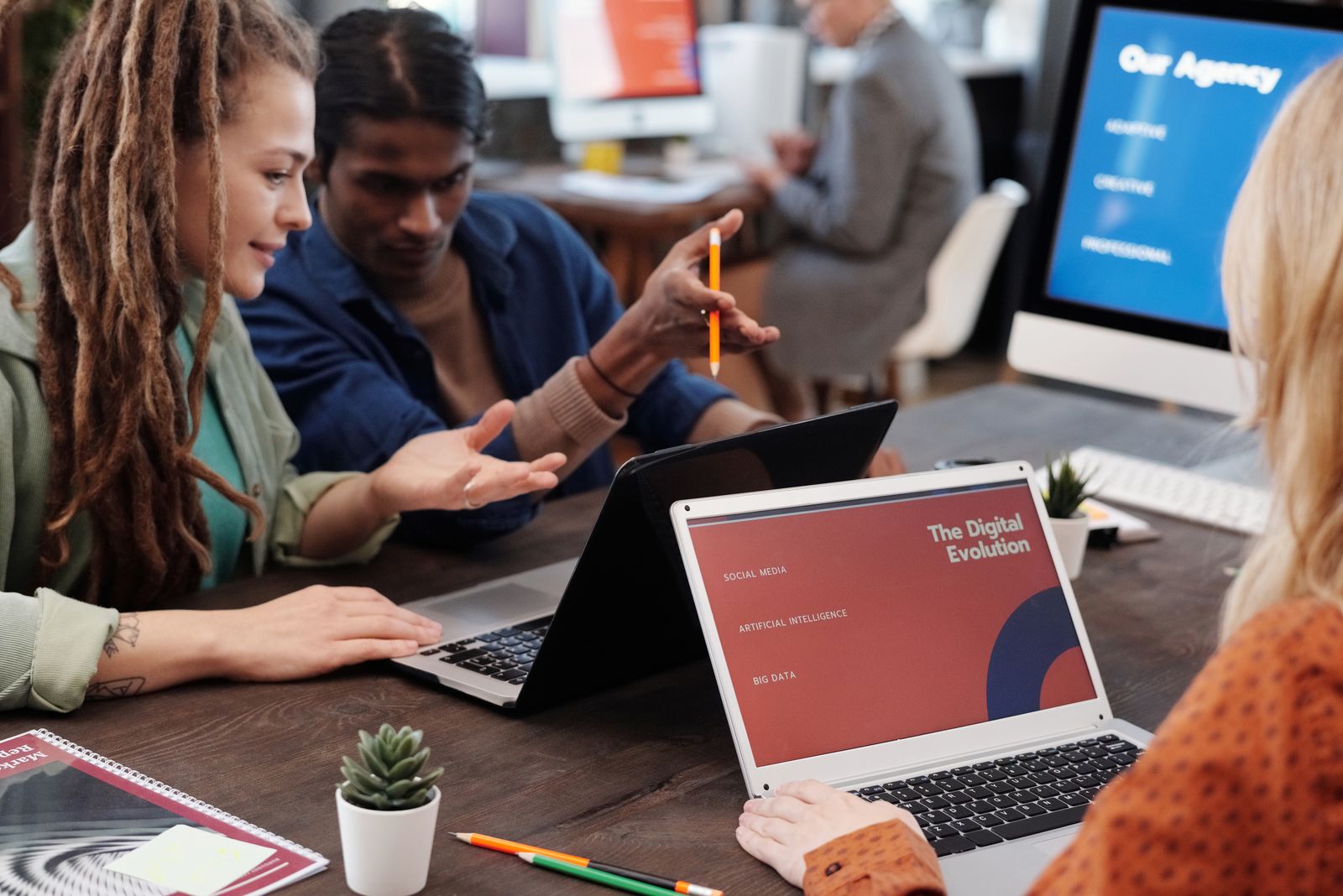 Ecommerce brand team reviewing a custom Shopify theme design with their development partner